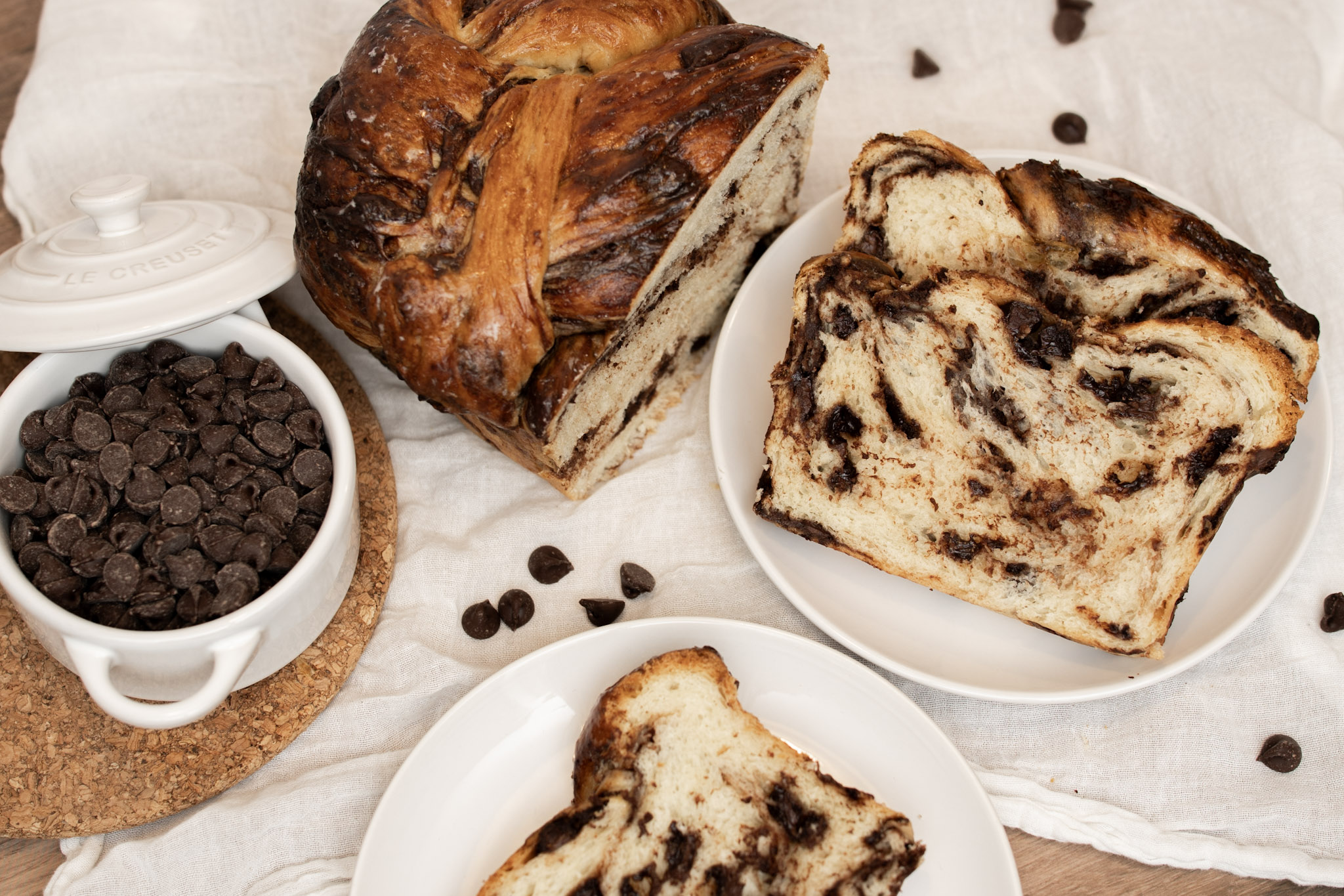 slices of chocolate chip brioche on plates